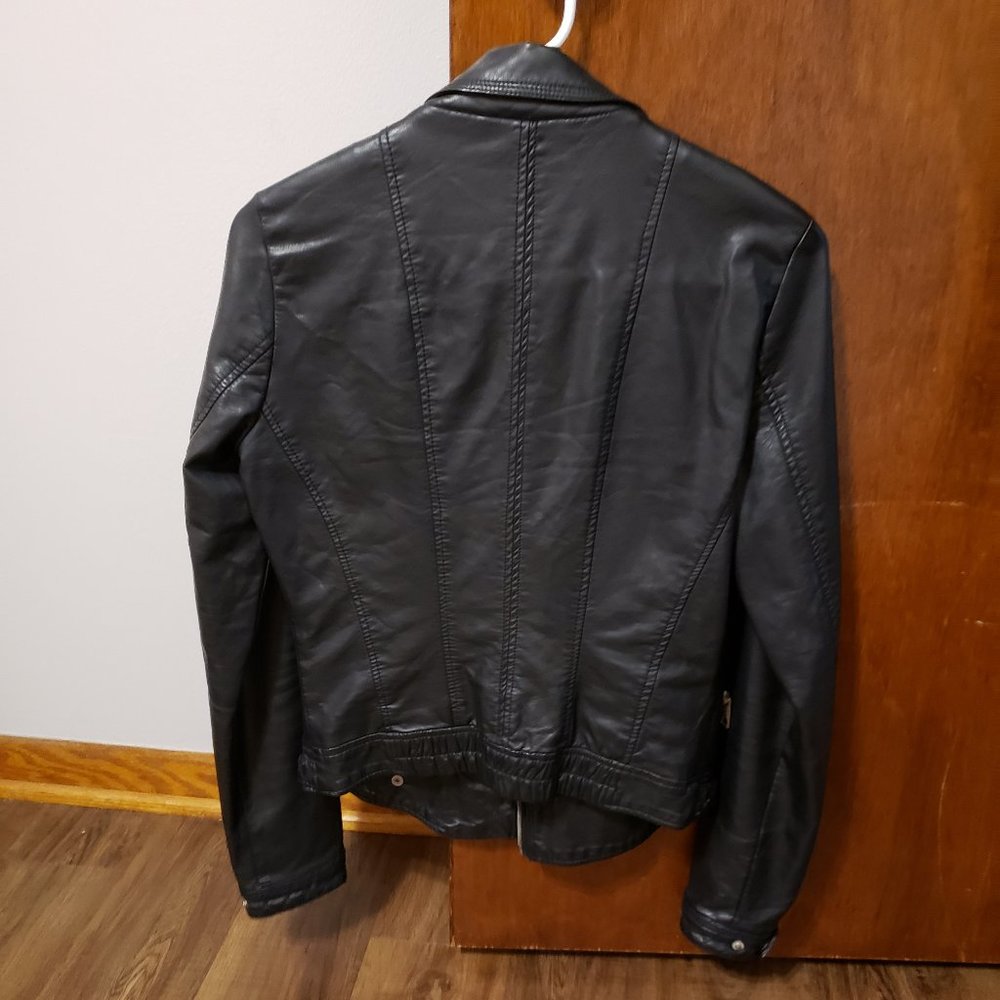 Black long sleeve leather moto jacket